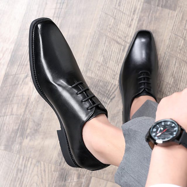 Ebonique Serpatura Lace-Ups