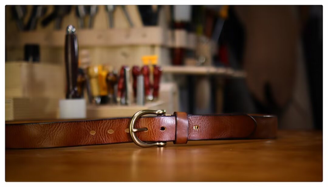 Elegant Cowskin Belt with Copper Finish