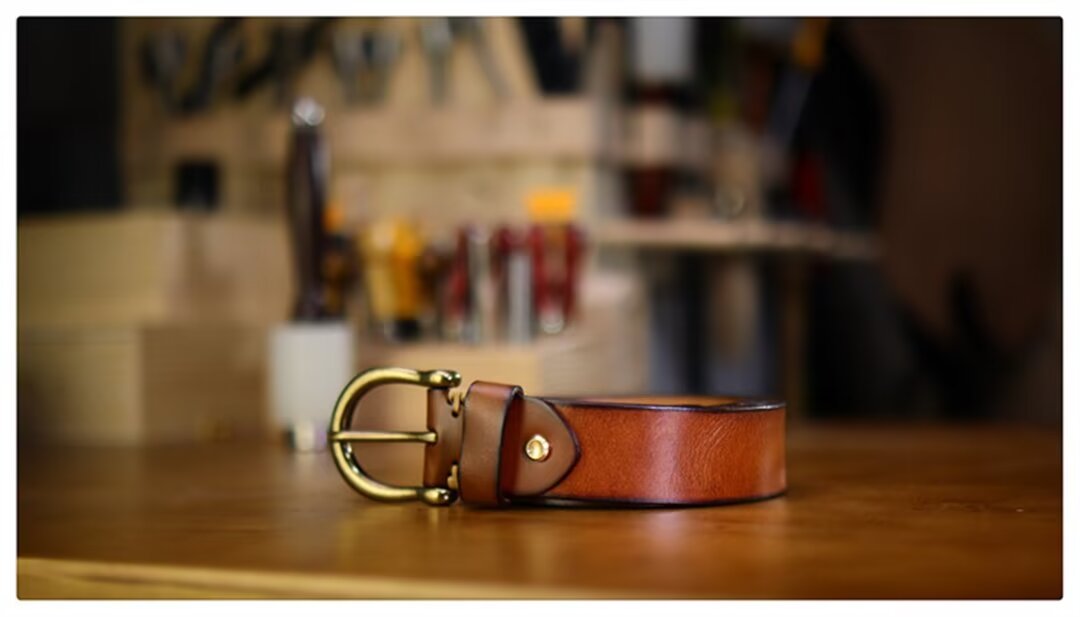 Elegant Cowskin Belt with Copper Finish